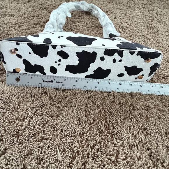NWT new Anthropologie melie bianco east west shoulder bag cow print black white - Picture 12 of 15